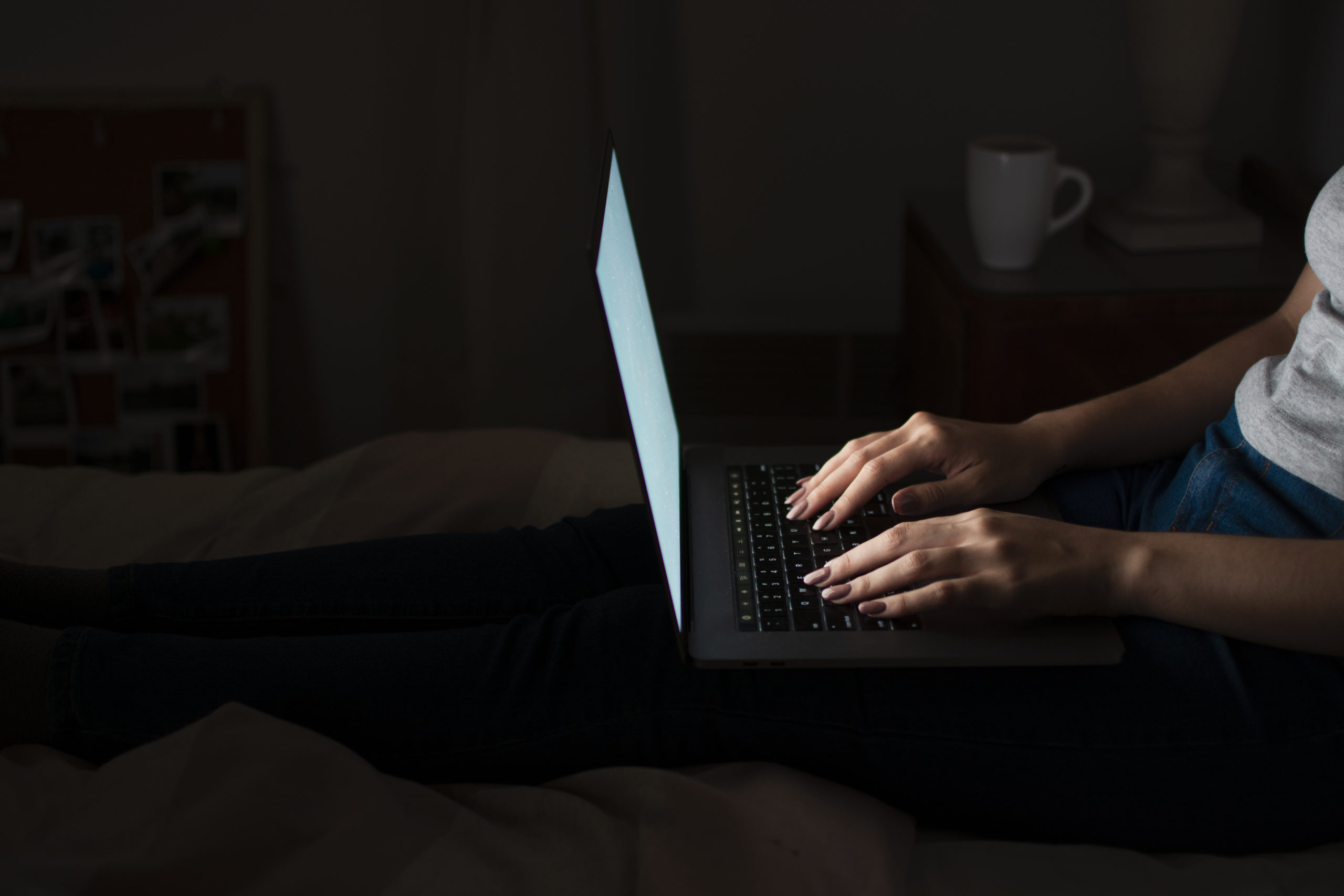 side-view-woman-working-late-home-laptop