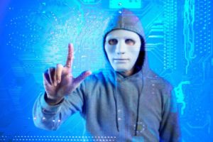 An image showing a man with a mask browsing through data. Personal Information on Fast People Search